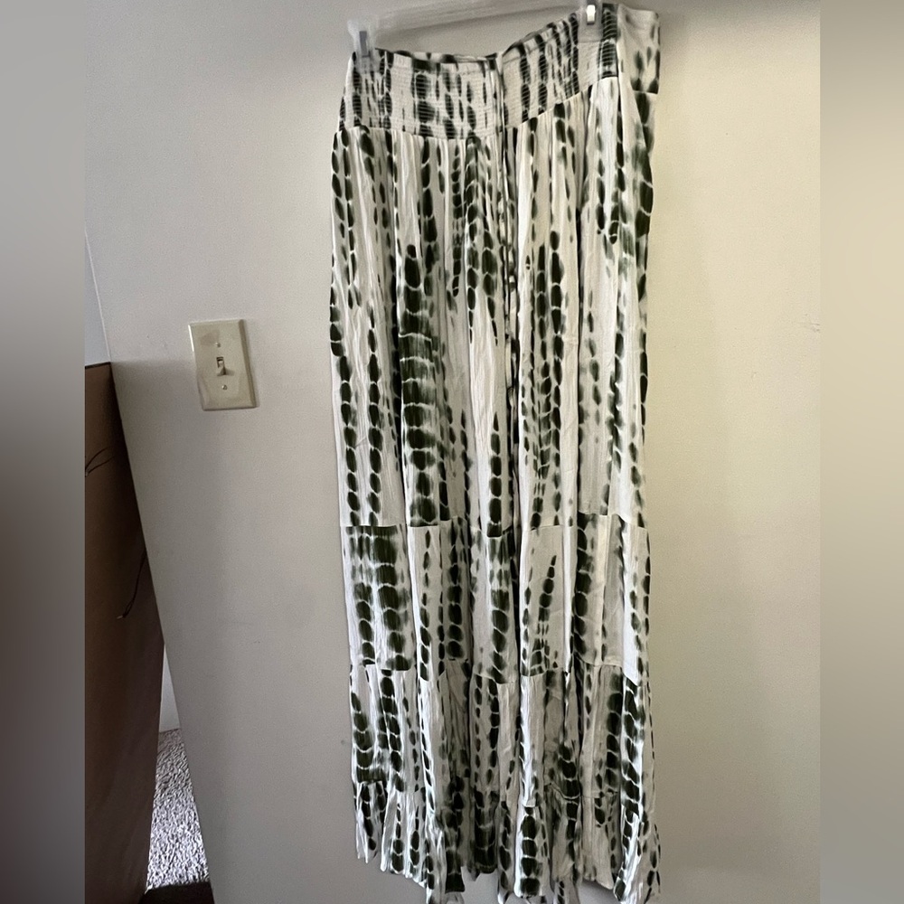 Earthbound, white and green tie dye dress, and ties around the neck.
